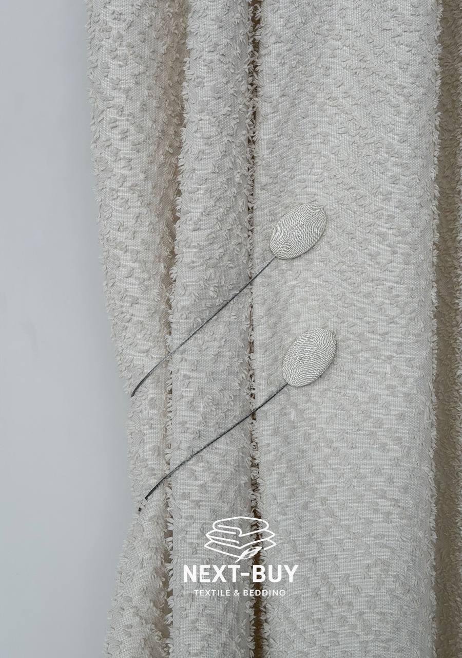 Магніт-підхват для штор овальний на тросі, кремовий Туречинна