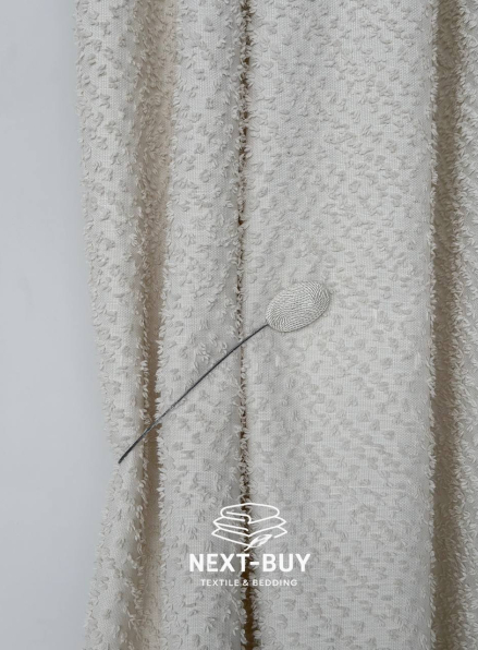 Магніт-підхват для штор овальний на тросі, кремовий Туречинна