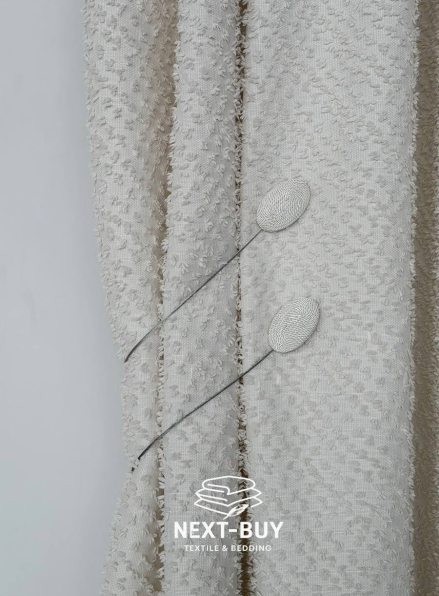 Магніт-підхват для штор овальний на тросі, кремовий Туречинна